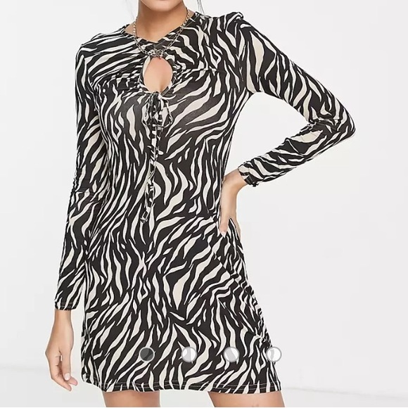 River Island Dresses & Skirts - river island zebra print long sleeve minidress w/keyhole neckline SZ 8 (UK 12)